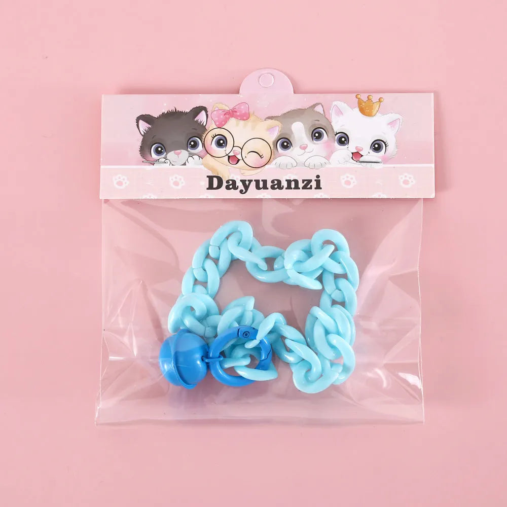 Macaron candy coloured plastic pet collar for cats, dogs and rabbits on a white background.