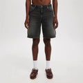 Men's loose straight-leg light blue jeans on a neutral background
