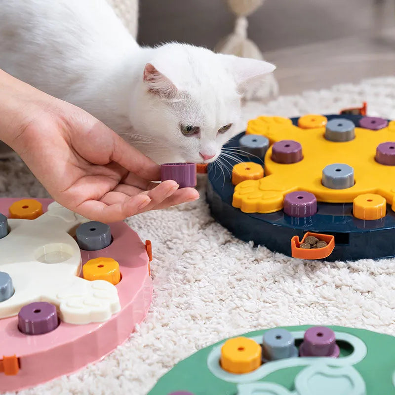 Interactive dog slow feeder puzzle toy in blue, green, and pink colour options.