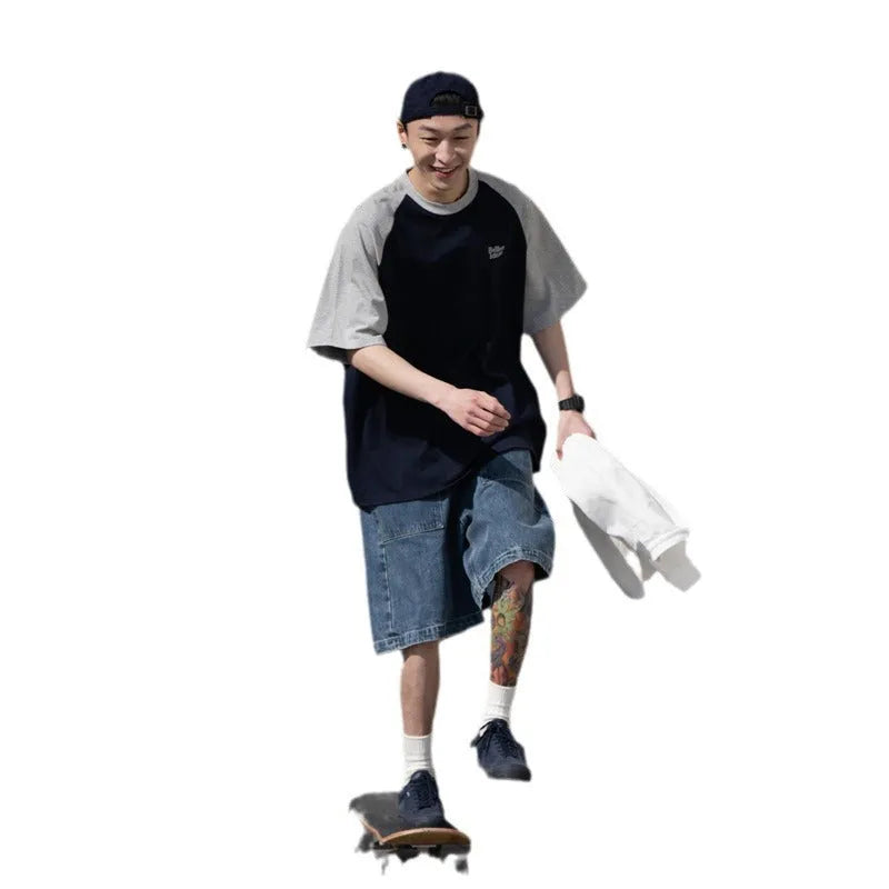 Blue loose-fit men's casual raglan sleeve T-shirt on a hanger