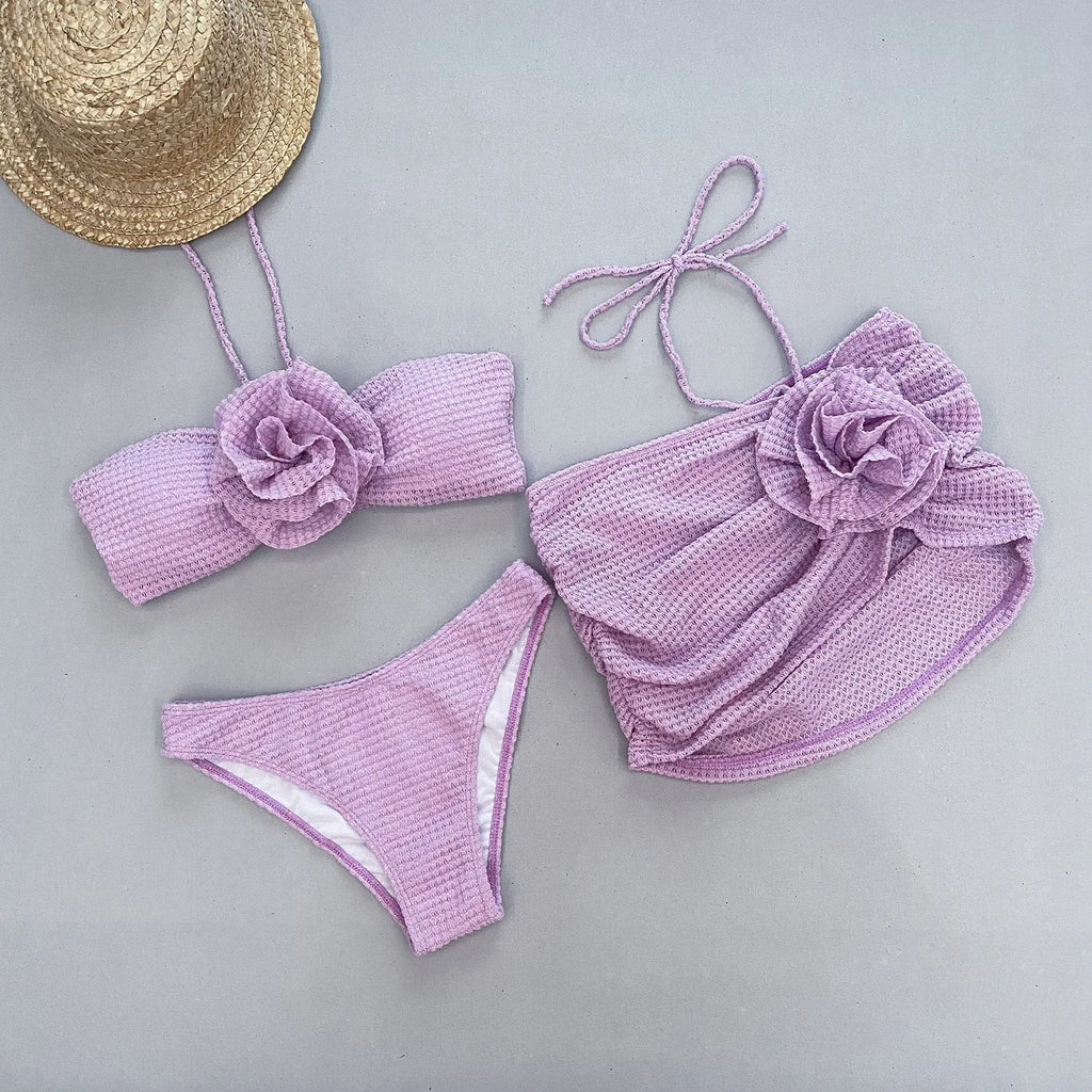 Women's 3D flower split bikini set in white or purple showing bra, panties, and skirt pieces