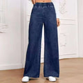 Plus size light blue washed denim trousers with a wide-leg straight cut and zip fly.