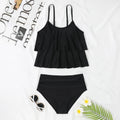 Black high waist swimsuit briefs with coconut tree print and sleeveless top on a mannequin