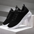 Pair of casual sports shoes with breathable mesh upper and flat rubber sole in purple, black, pink or rose red