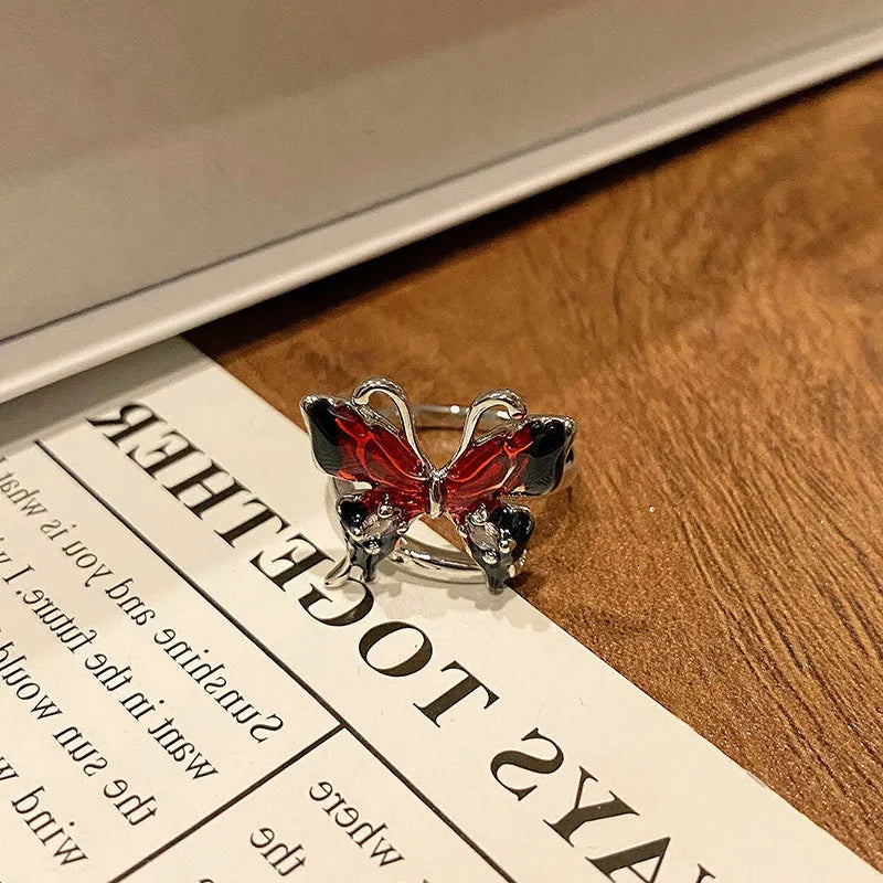 Copper women's ring with Chinese butterfly design and oil-drip finish in simple jewellery style
