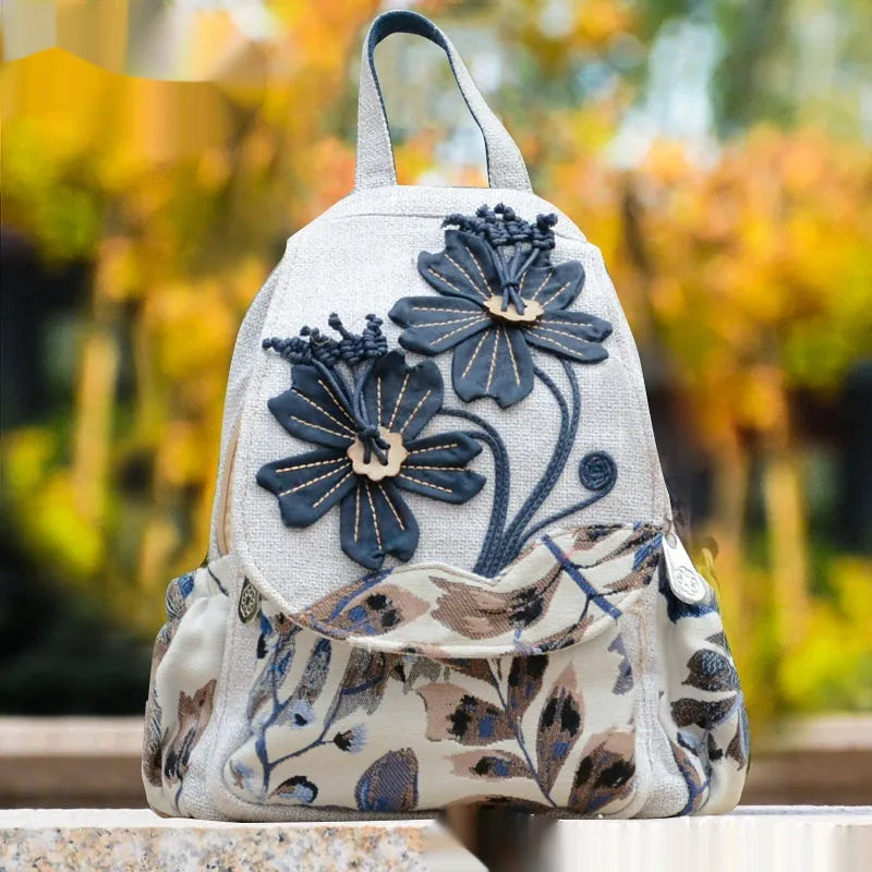 Ethnic style retro canvas backpack with floral print and outer pocket, soft construction for leisure travel