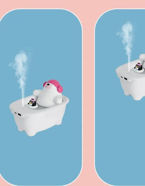 White compact USB air humidifier with large water tank on a desktop.