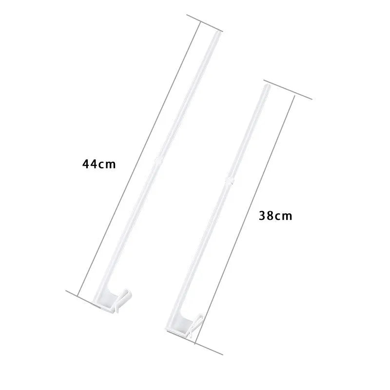Ten white plastic car window flag holder clips arranged together.