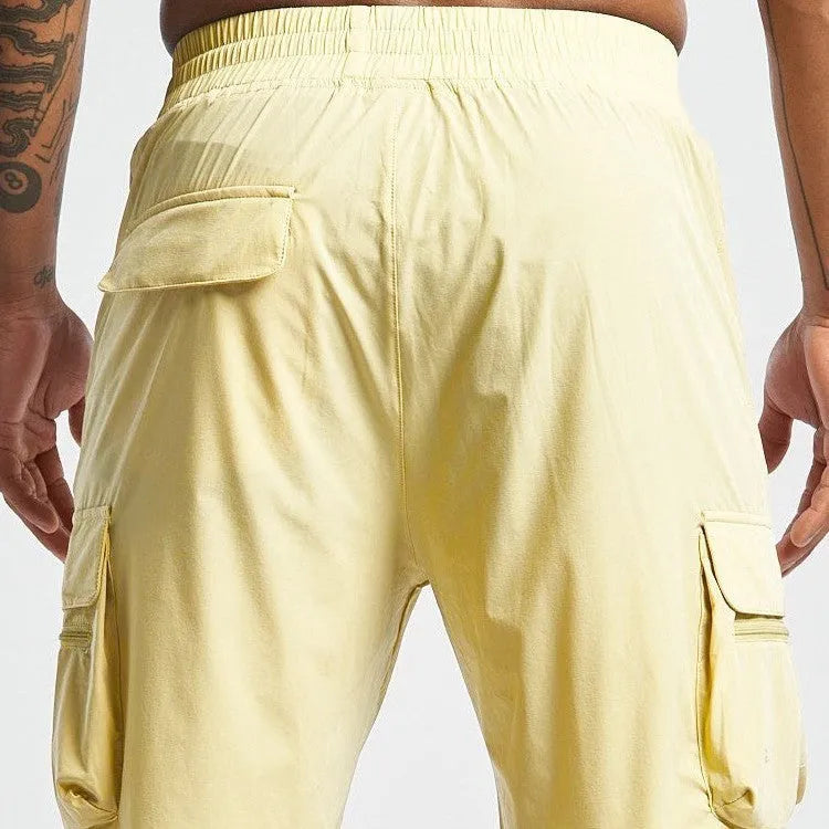 Men's black sports shorts with four-way stretch fabric and quick-dry lining for athletic activities