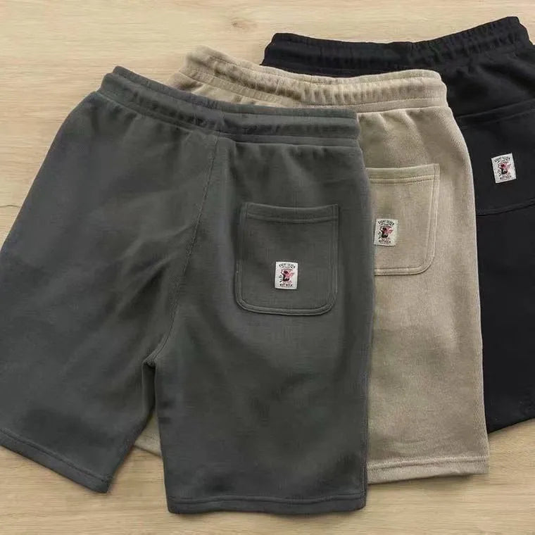 Men's retro loose knitted shorts in polyester, long leg, mid-waist, available in khaki, grey, and black, sizes M to XXXL