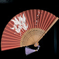 Traditional Chinese bamboo folding fan with Su embroidery patterns including orchid and butterfly designs