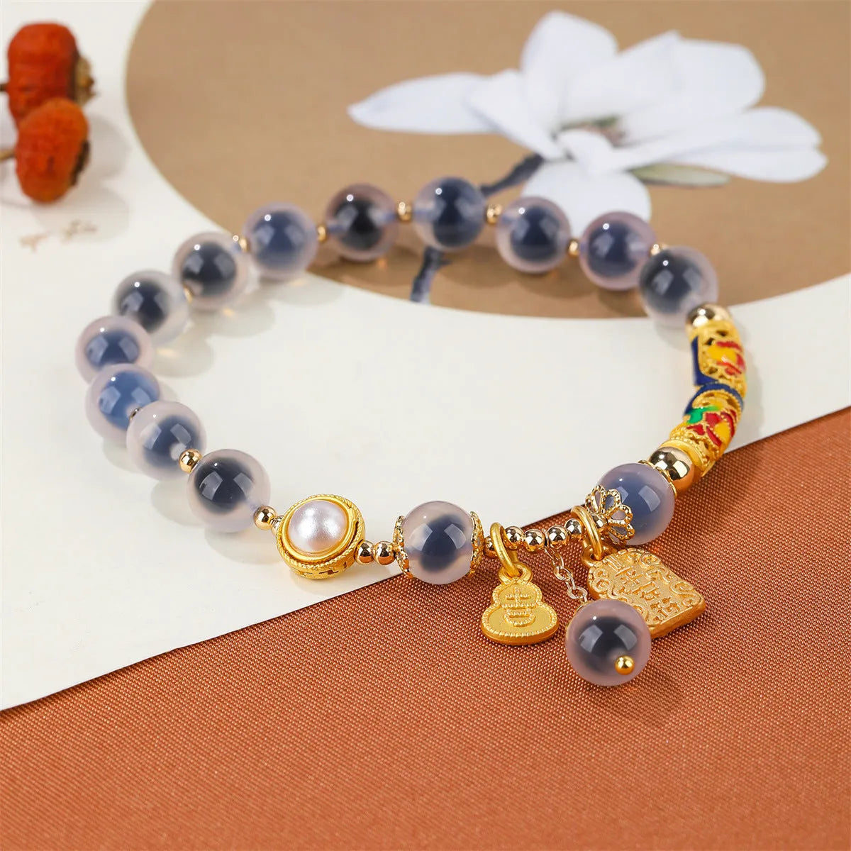 Sugar heart agate bracelet with retro minority design on woman's wrist showing handmade craftsmanship