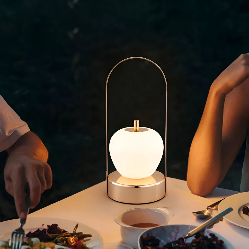 Rechargeable bedside table lamp with metal holder, golden, portable for camping and emergency use, USB charging