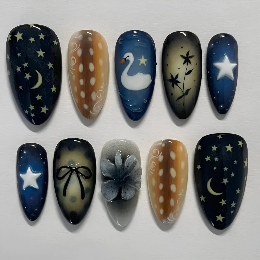 Women's French nail tip set with star moon swan bow flower pattern and glue
