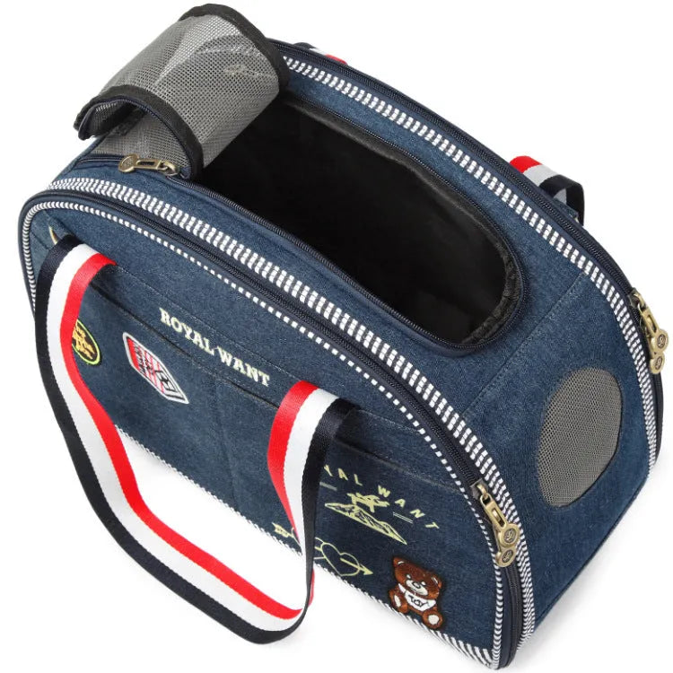Blue denim Japanese-style pet carrier bag with cartoon pattern, dimensions 43x20x30cm.
