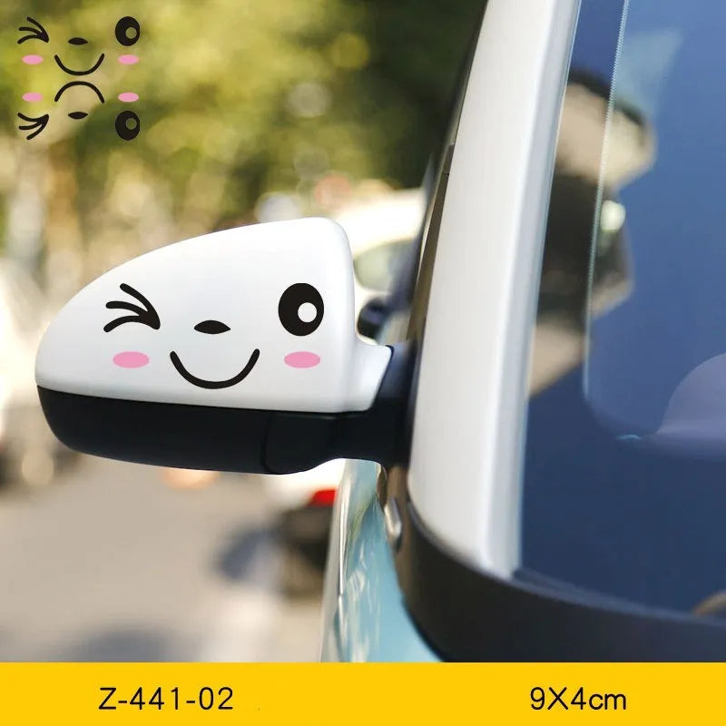 A pair of reflective cartoon eye car stickers made from PET vinyl, designed for vehicle body or rearview mirror.