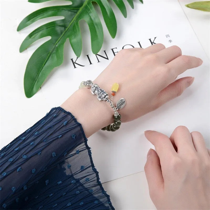 Pure silver coin bracelet with 8x7mm Hetian jade centrepiece in retro women's jewellery design