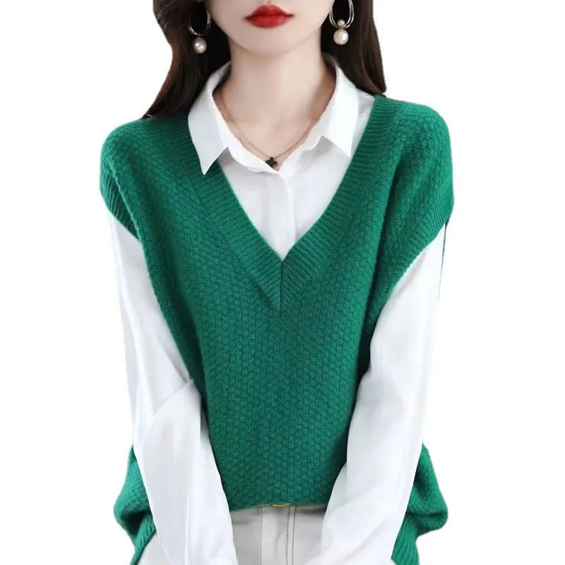 Women's creamy-white knitted vest with 3D pattern, V-neck, and sleeveless pullover design.