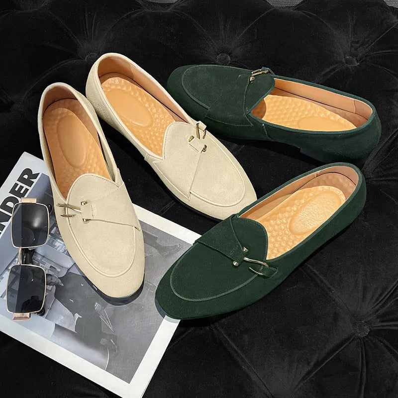 Pair of men's cow split suede leather loafers with low heel and metal detail in beige