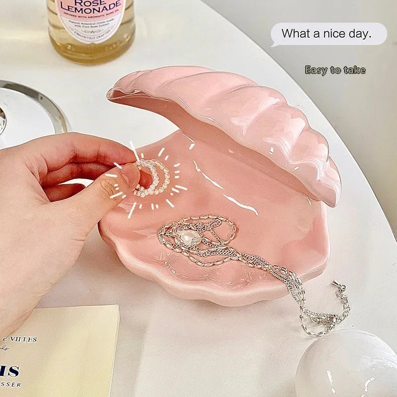 White porcelain storage tray with optional small integrated LED night light, shown in pink and white colour options.