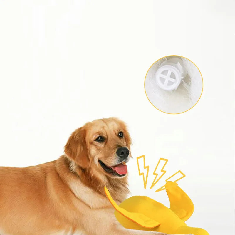Yellow duck plush dog toy with squeaker and treat dispensing features
