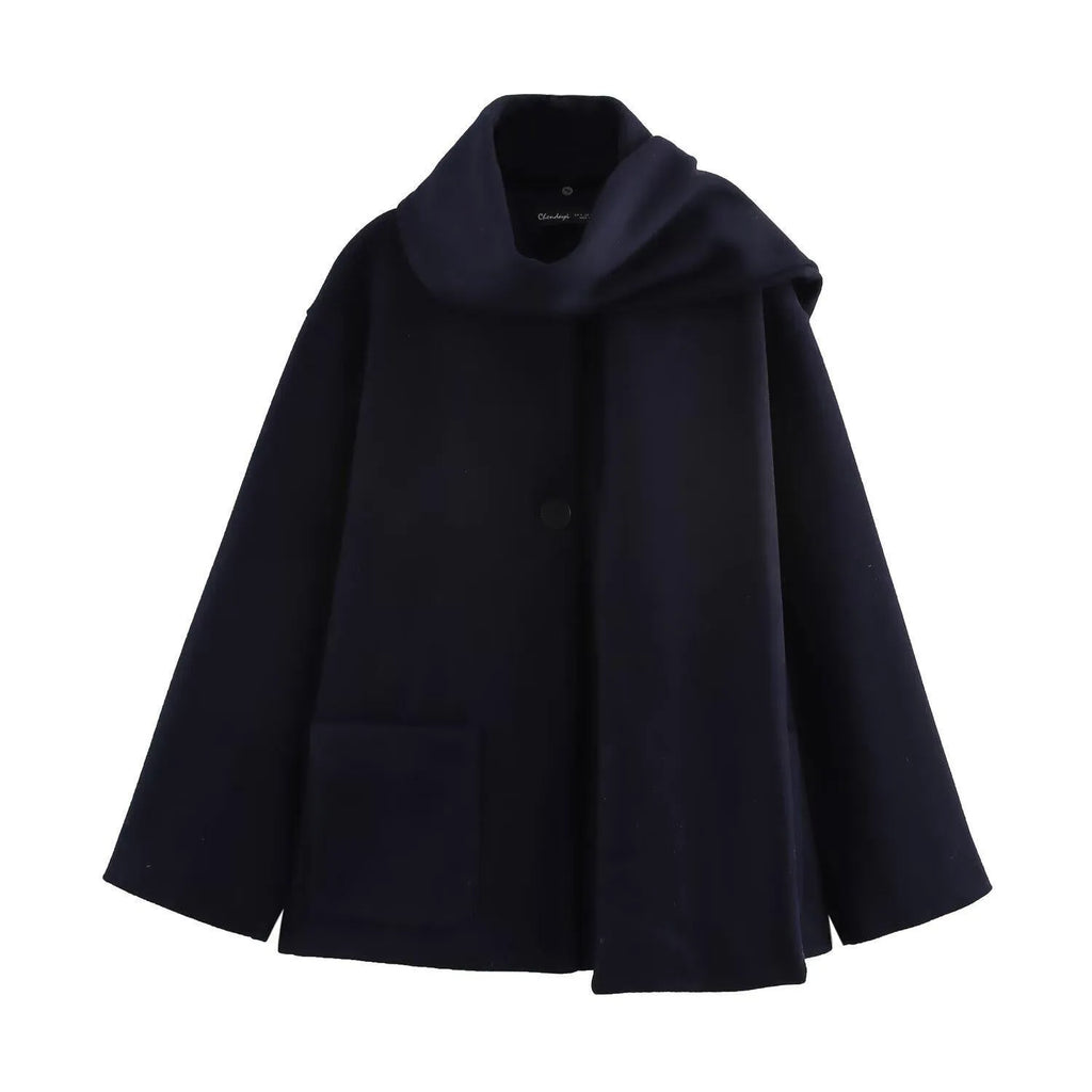 Women's longline polyester coat with an artificial fur collar in a street fashion style.