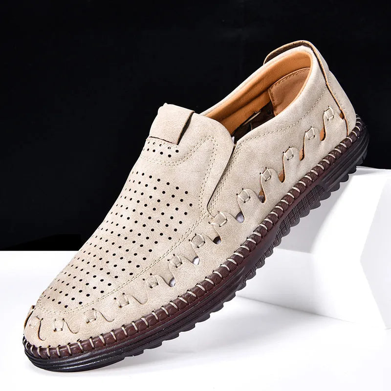 Men's brown handmade leather slip-on casual shoes with flat heel and round toe.