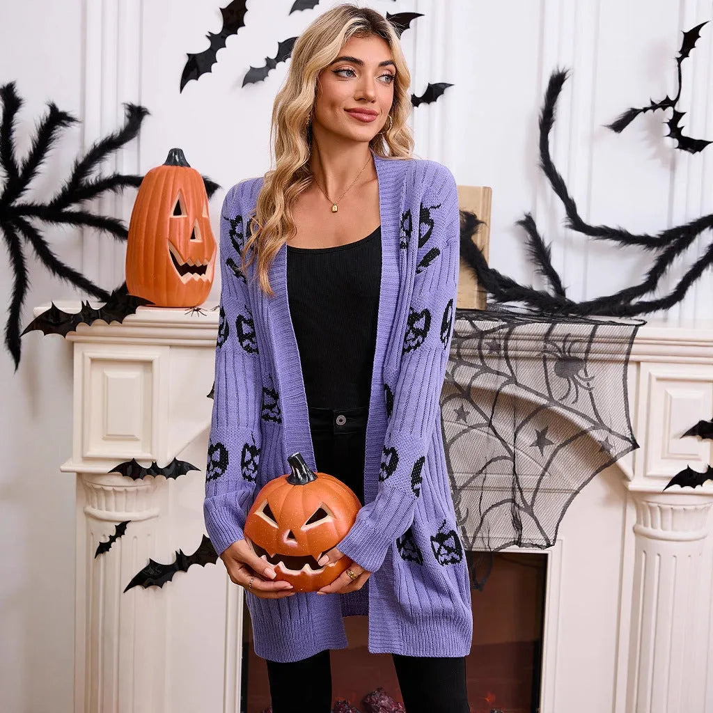 Women's black cardigan with orange pumpkin head jacquard pattern, open front, regular sleeves.