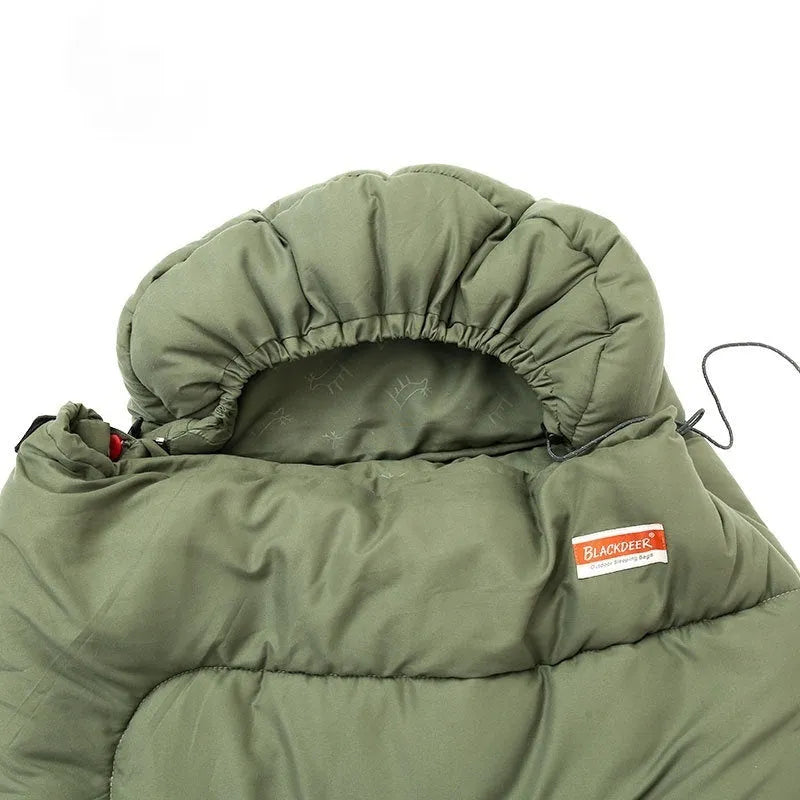 Olive green cotton sleeping bag quilt laid out flat for camping.