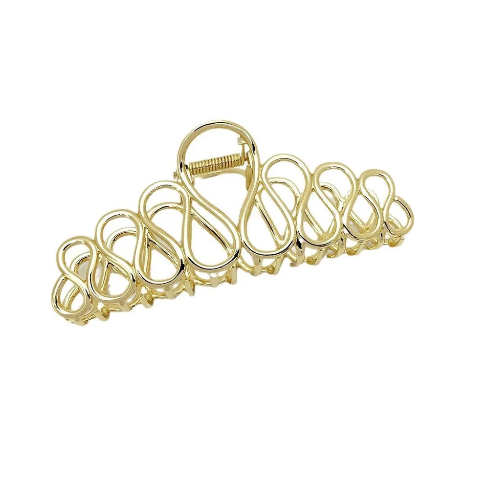 Minimalist large updo hair clip with tassel detail in gold or silver electroplated alloy