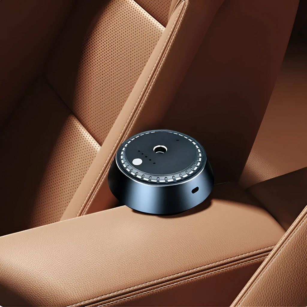 Black metal USB rechargeable car aroma diffuser showing compact size and design