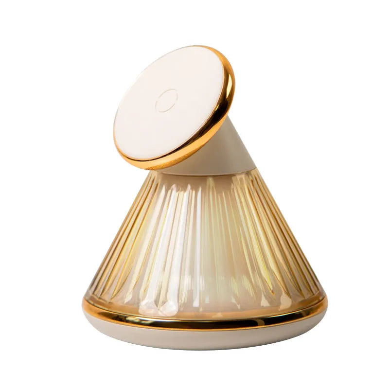 Night table lamp with magnetic wireless charging seat showing champagne gold finish and adjustable lighting