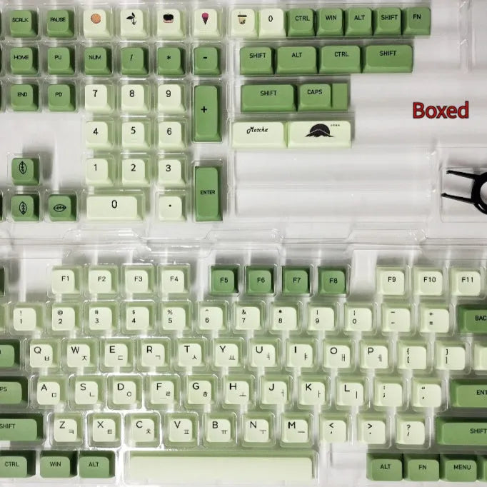 124 PBT dye-sublimation keycap set in matcha green colour on a keyboard.