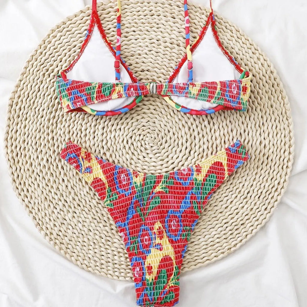 Red floral print women's underwire bikini top and briefs on a mannequin.