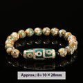 Green Dzi bead barrel shaped bracelet with 8mm handmade beads and Tibetan-inspired design