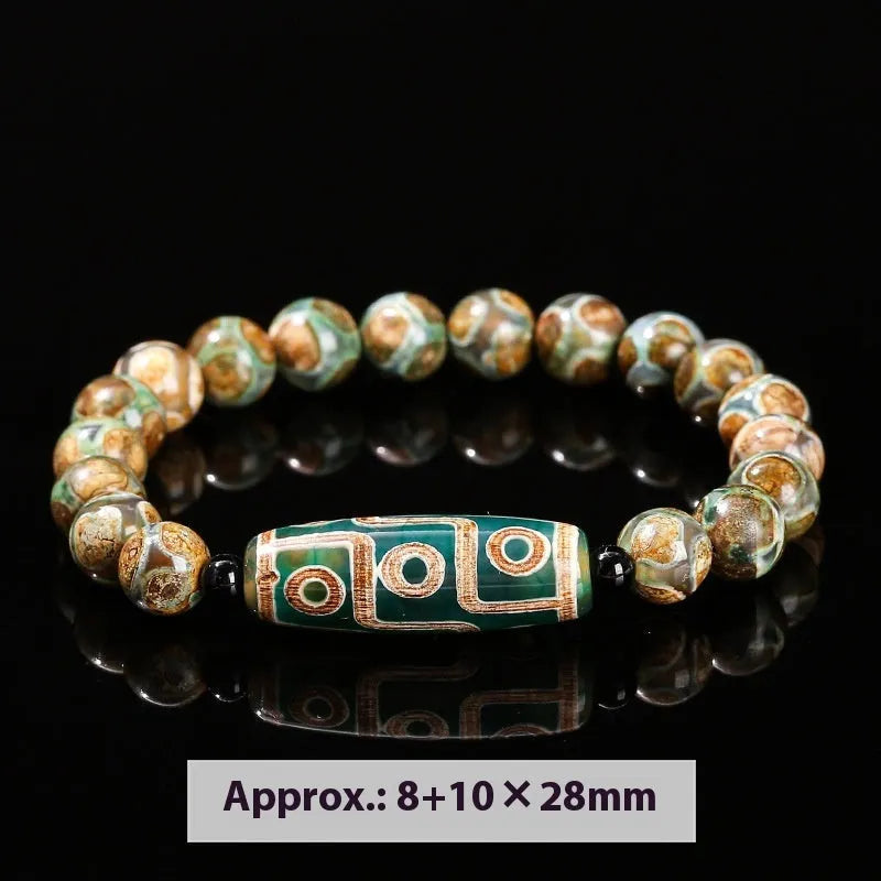 Green Dzi bead barrel shaped bracelet with 8mm handmade beads and Tibetan-inspired design