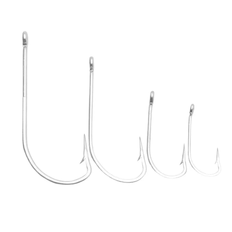 Assortment of stainless steel alloy fishhooks for sea fishing on a blue background.