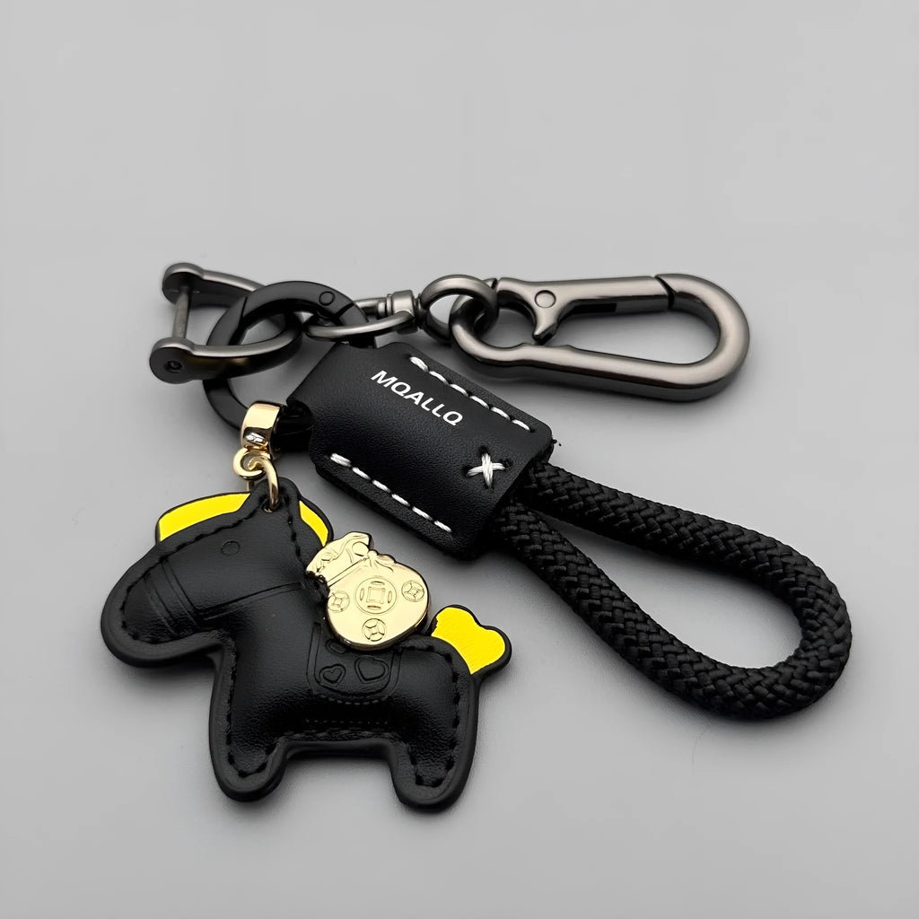 Handmade cowhide key ring pendant with a detailed zinc alloy pony buckle and coloured flannelette rope.