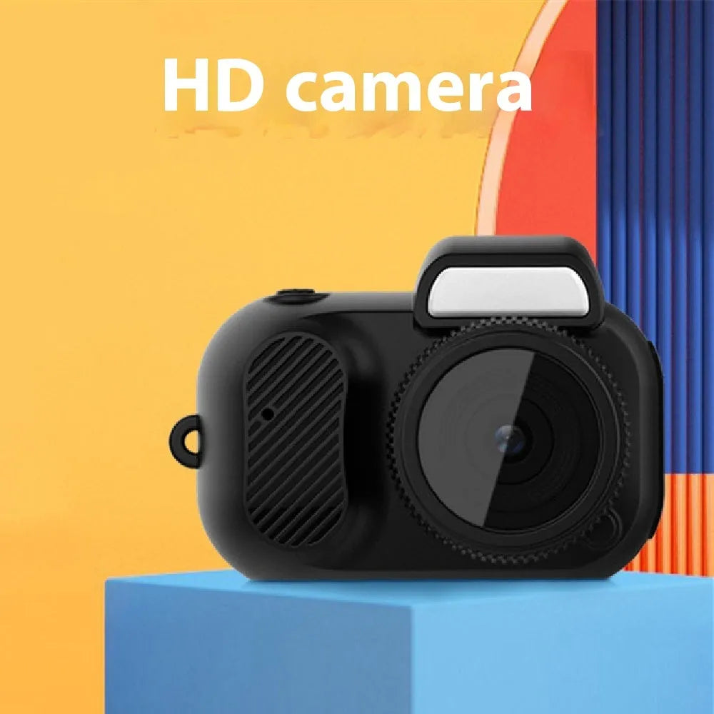 Black retro mini video camera with built-in screen showing 1080p HD recording