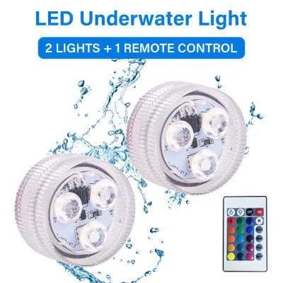 Small white rectangular waterproof LED light for aquariums with remote control on a blue background.