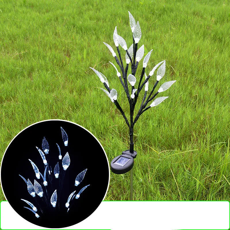 Solar-powered leaf branch garden light measuring 73cm tall with iron and plastic construction