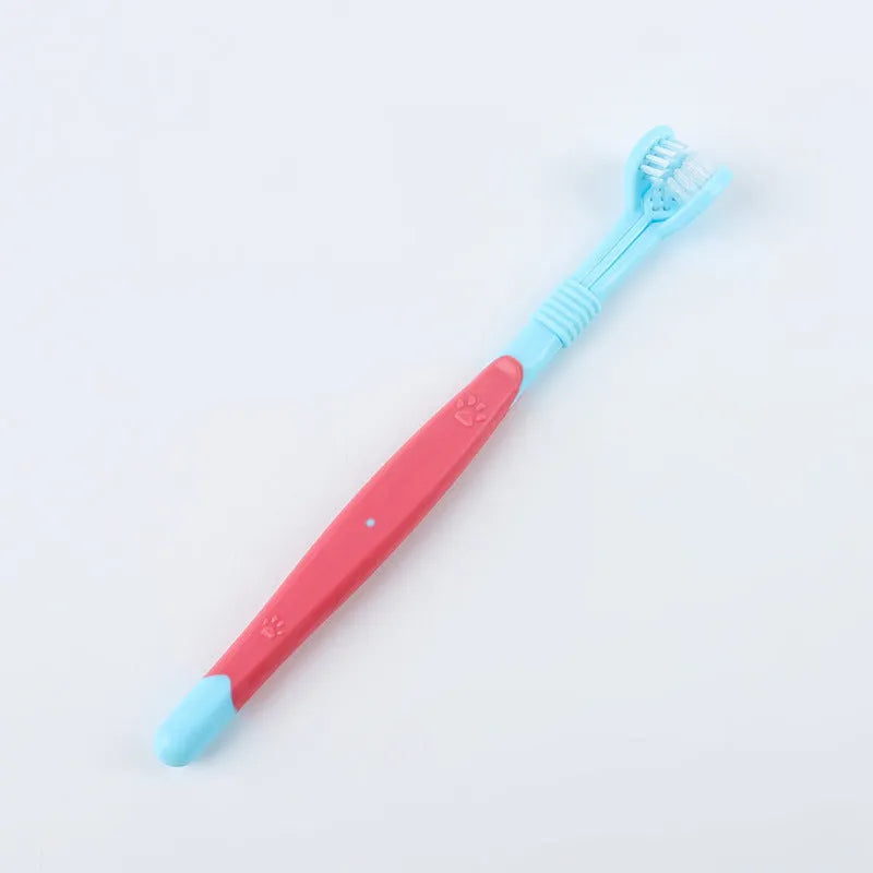 Pet toothbrush with soft nylon bristles on a plastic handle in various colour options for dogs and cats