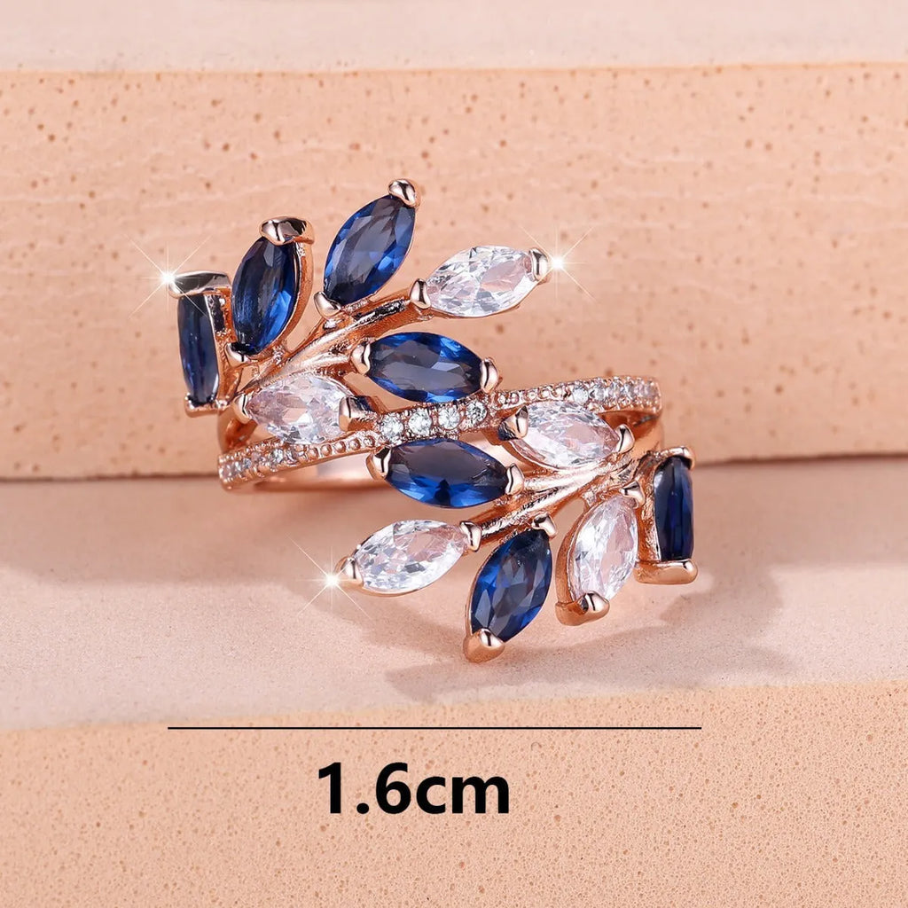 Copper leaf-shaped adjustable ring with Platinum sapphire blue finish