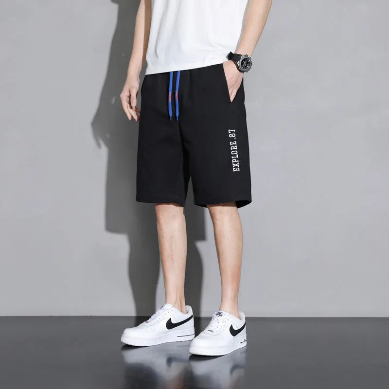 Cotton mid-waist shorts for boys in black, available in plus sizes from M to 8XL.