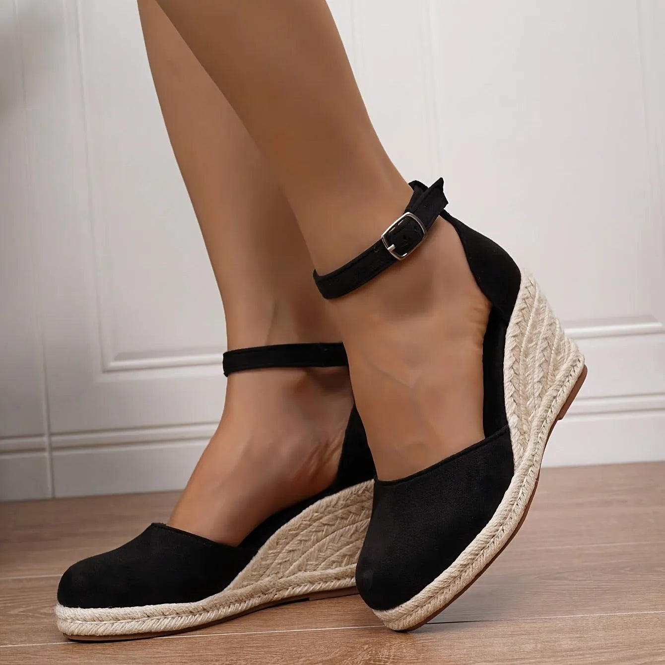 Women's apricot and black wedge sandals with suede upper and buckle closure on rubber sole