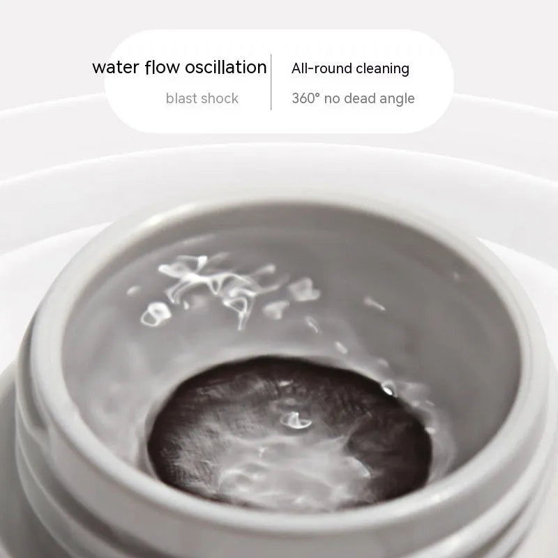 Pearl white automatic electric ultrasonic flushing instrument for cleaning invisible glasses.
