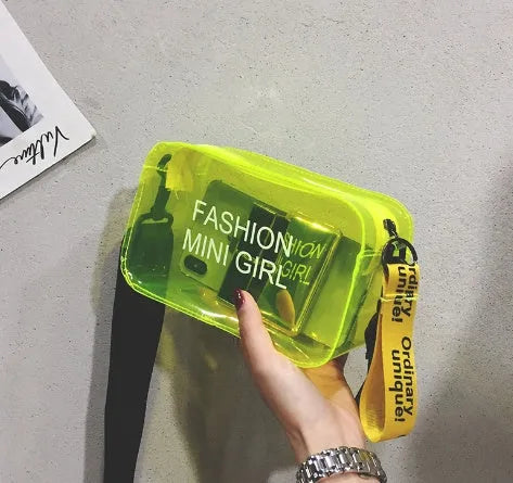 Transparent square jelly shoulder bag in PC material with an adjustable strap, shown in a light colour.