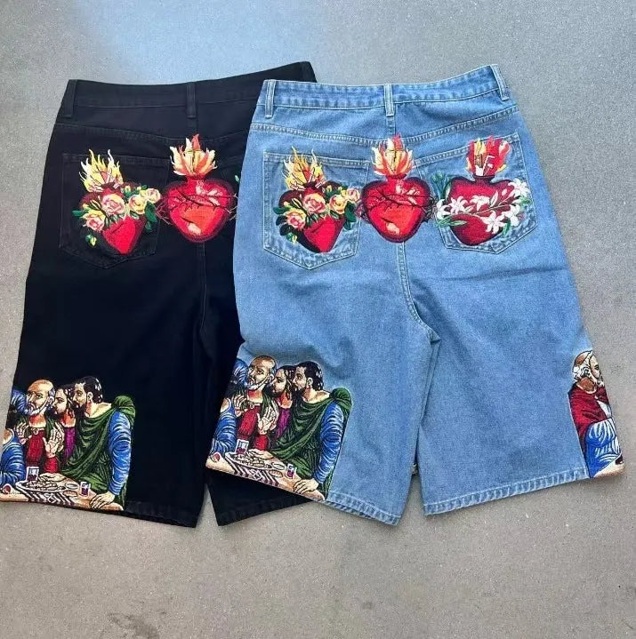 Men's blue cotton shorts with Jesus print on back pocket showing tapered fit design