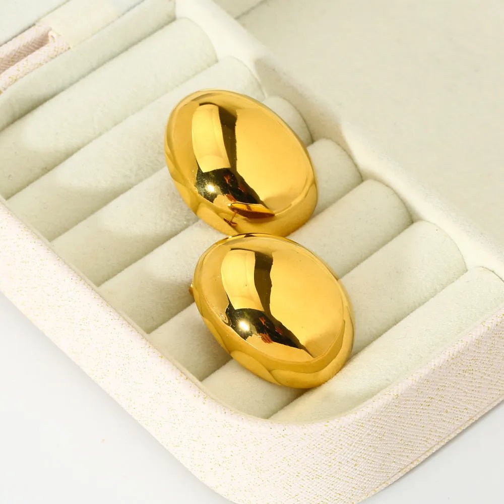 Geometric stainless steel ear studs with a glossy 18K gold tone electroplated finish