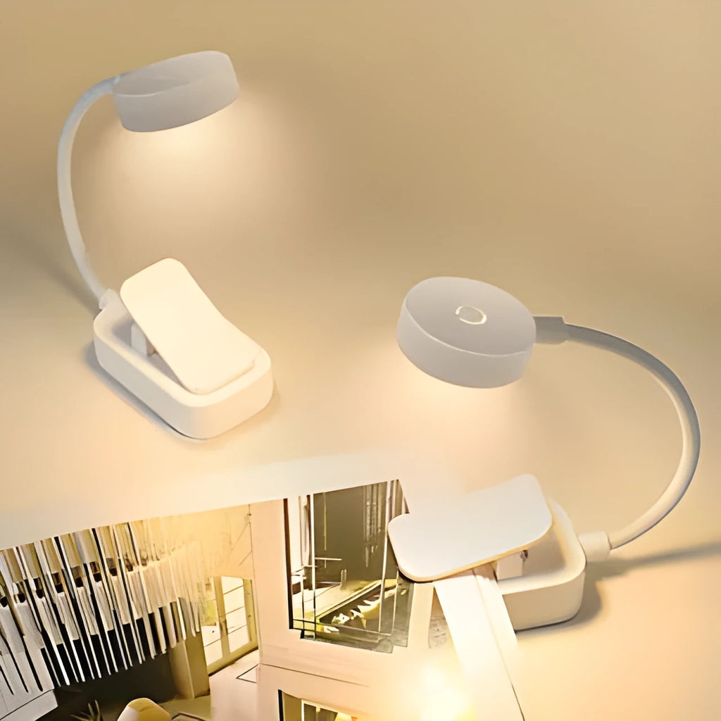 Portable rechargeable clip light in modern simplicity style clipped onto a desk for reading